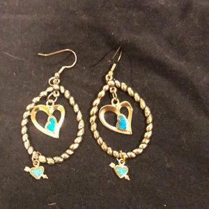 Silvertone dangle earrings with hearts